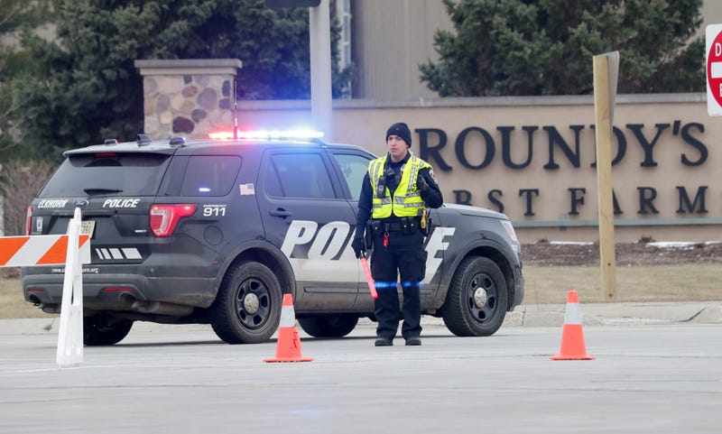 Police respond to an incident at the Roundy's distribution warehouse at 1120 Distribution Ct. in Oconomowoc on Wednesday, March 17, 2021. Roundys Tactical 01224