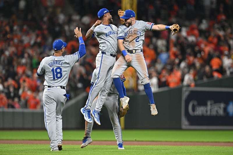 Oct 2, 2024; Baltimore, Maryland, USA; Kansas City Royals players including Garrett Hampson (2), Maikel Garcia (11) and Yuli Gurriel (18) celebrate after defeating the Baltimore Orioles in game two of the Wild Card round for the 2024 MLB Playoffs at Oriole Park at Camden Yards. Mandatory Credit: Tommy Gilligan-Imagn Images