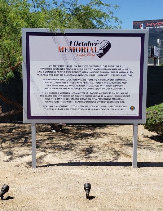 A sign explains a future memorial to remember the victims of the 1-October shooting