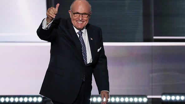 Crowd laughs and jeers as Rudy Giuliani tells commission Biden stole election and Detroit is one of the 'most corrupt cities in the nation'