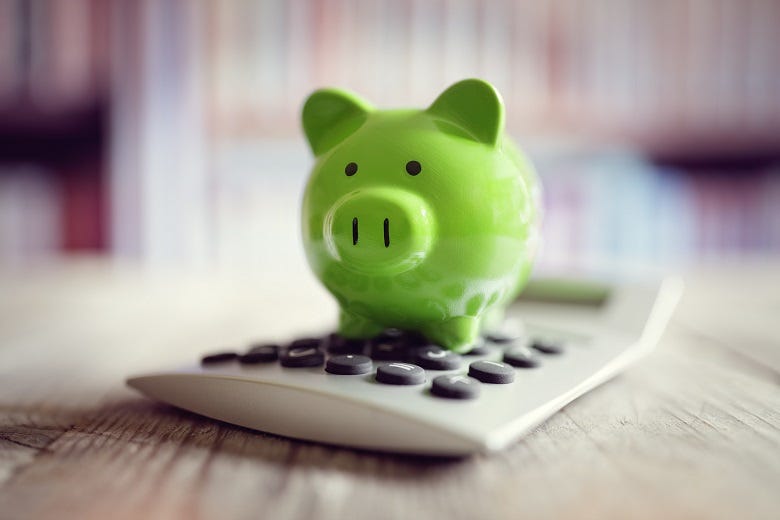 piggy bank on calculator 