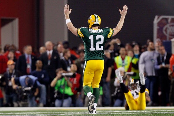 Aaron Rodgers celebrates a TD in the Super Bowl