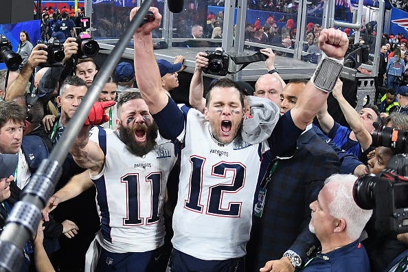 Tom Brady and Julian Edelman celebrate a Patriots Super Bowl