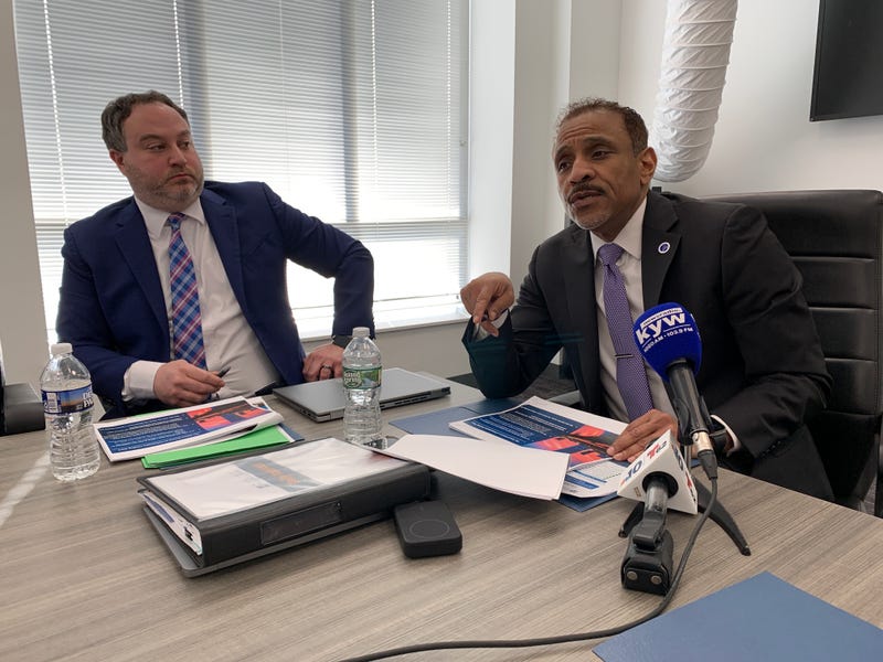 Superintendent Tony Watlington and Chief Financial Officer Mike Herbstman speak to reporters prior to Thursday's school board meeting.