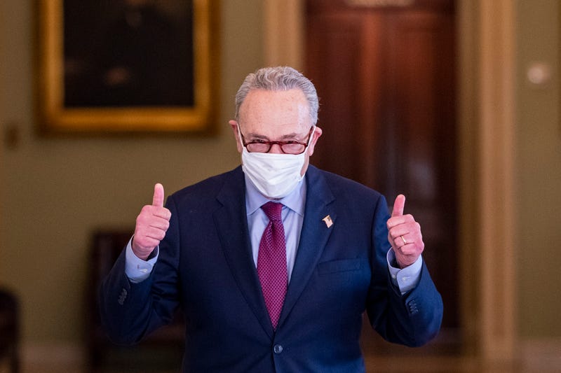 Senate Majority Leader Chuck Schumer gives a "thumbs up" after 50-49 passage of the president's $1.9 trillion COVID relief package, 3/6/21
