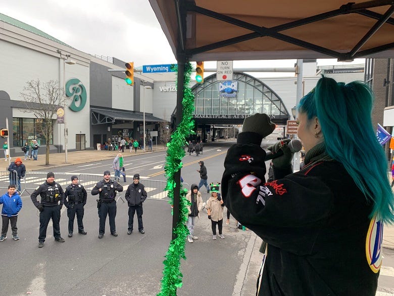 Charlotte Sands waving to Scranton's finest
