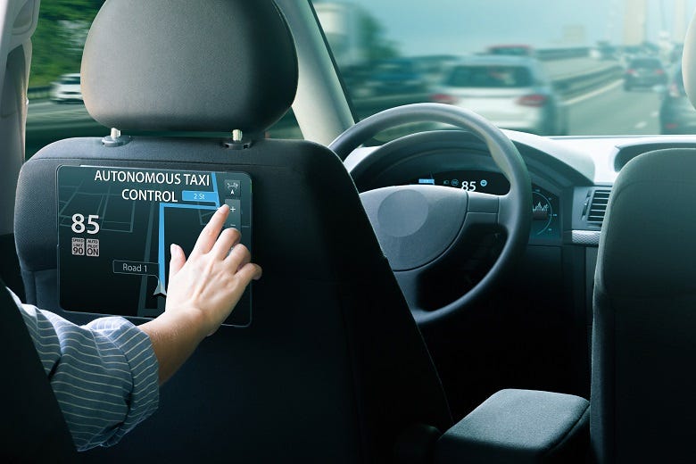 passenger in back seat of self-driving car