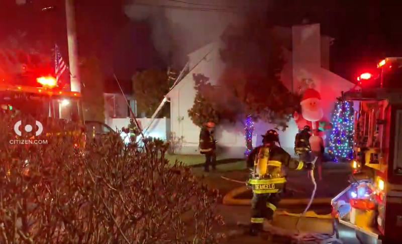 About 60 firefighters and EMTs responded to the house fire, which took an hour to get under control