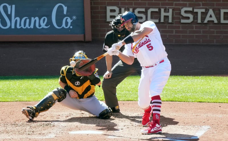 St. Louis Cardinals Albert Pujols swings, hitting a solo home run, his 702 career home run, in the third inning against the Pittsburgh Pirates at Busch Stadium in St. Louis on Sunday, October 2, 2022. The at bat is Pujols' last at bat during the regular season as a member of the St. Louis Cardinals.  
