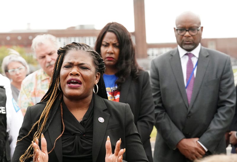 Congresswoman Cori Bush speaks at a microphone