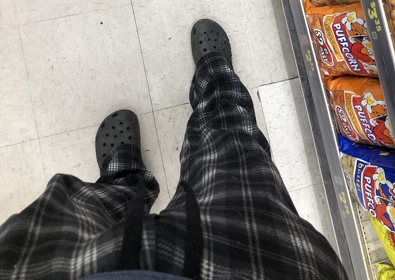 Joe Snedeker wearing PJ's & crocs 
