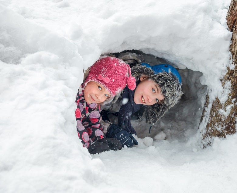 kids in a snow fort