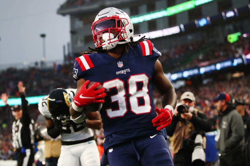 Rhamondre Stevenson of the Patriots scores a touchdown in the fourth quarter against the Jacksonville Jaguars, 1/2/22