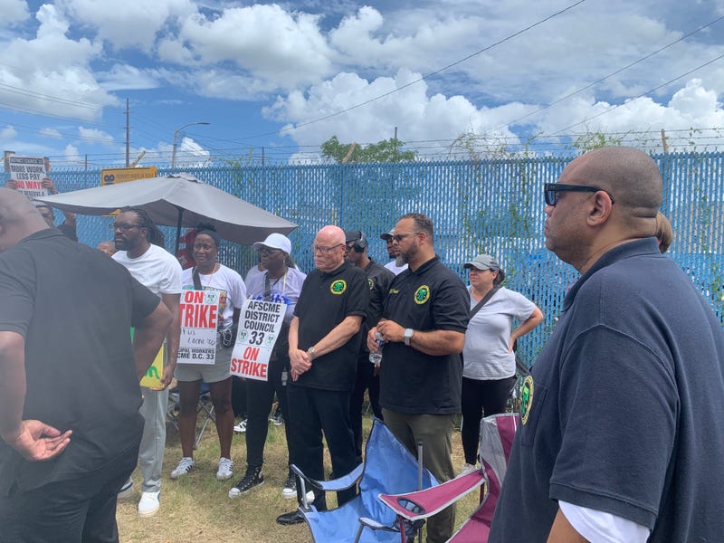 DC 33 President Greg Boulware with striking workers on Monday, July 7, 2025.