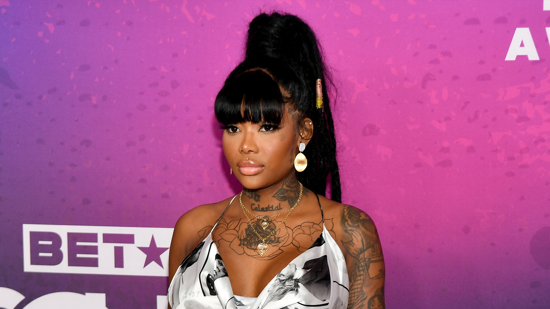 Summer Walker shows off her matching face tattoo with boyfriend 'Larry'