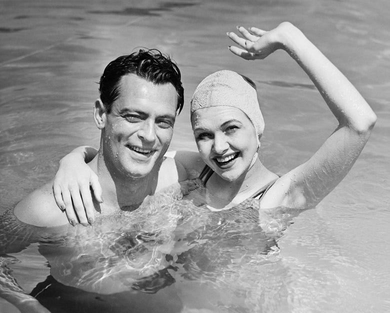 retro photo of couple in swimming pool