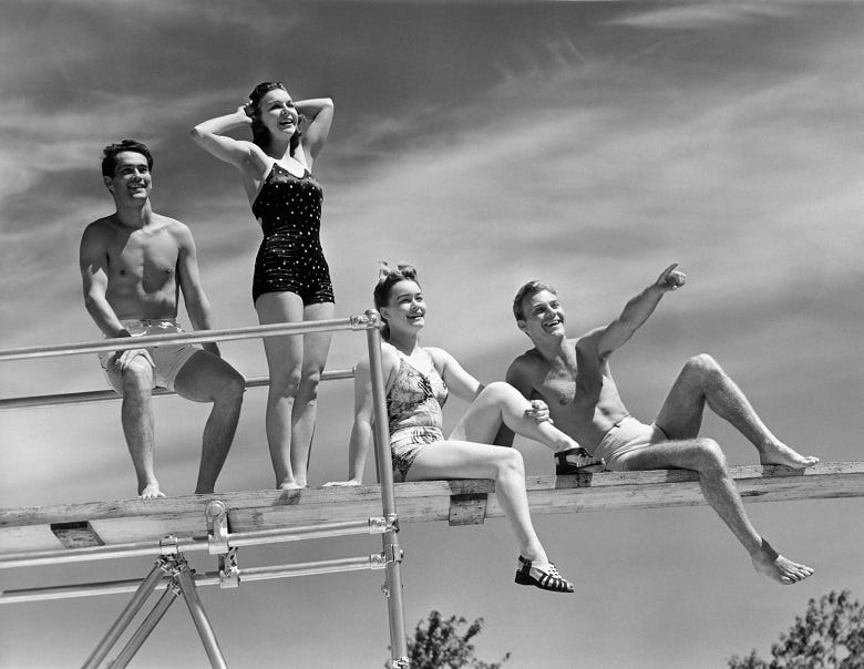 Old school photos of swimmers on diving board