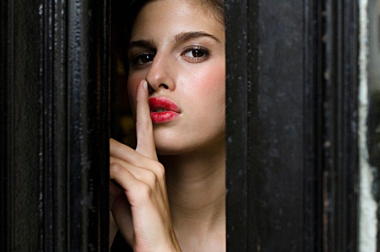 sexy woman peeking thru door