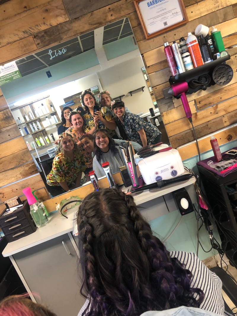 Alanna and most of her bridesmaids getting ready for the wedding
