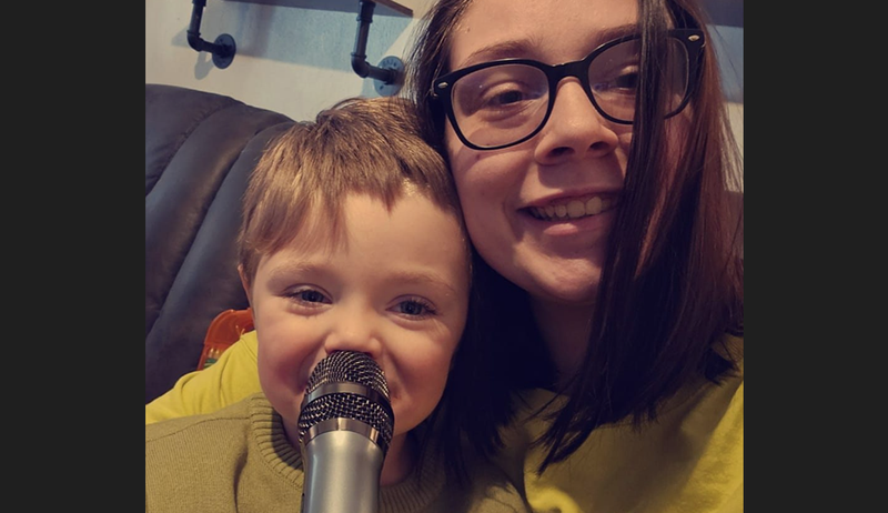 Savannah M with her son