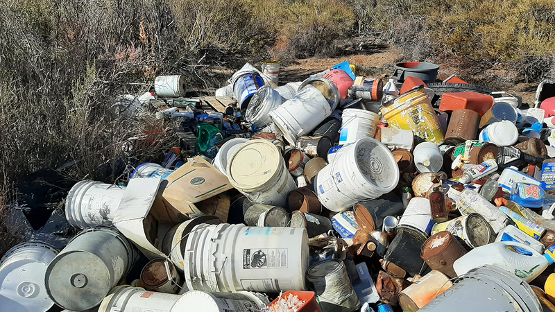 Dozens of buckets and paint cans found littering the Cleveland National Forest in February 2022. 