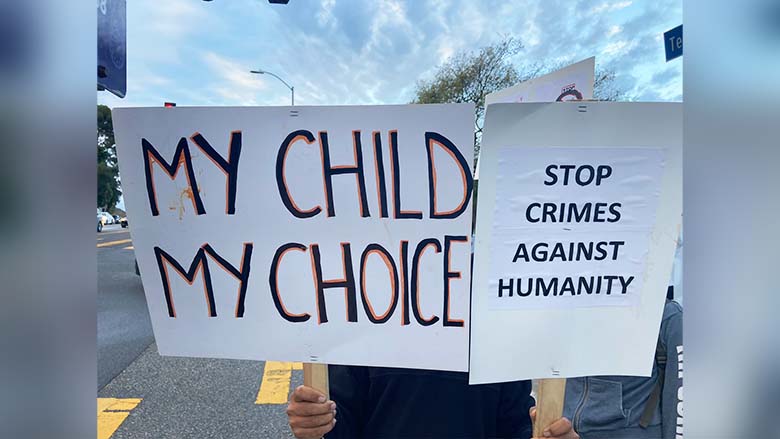 ‘Stop medical tyranny!’ Vaccine protesters gather outside Pacific Palisades High School
