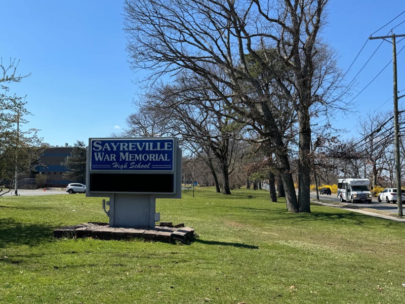 A child was found dead in a burning car in the vicinity of Sayreville War Memorial High School on Friday.