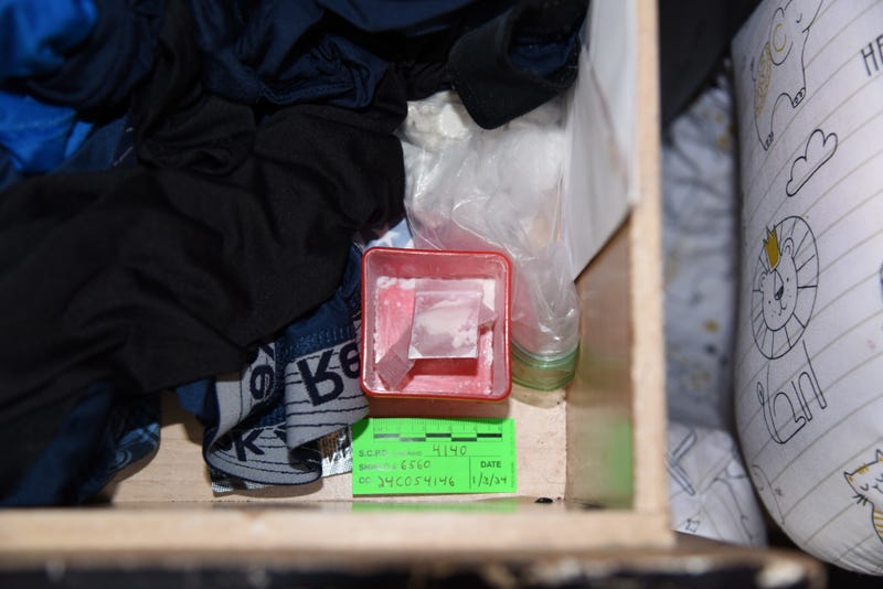 Images of drugs show the alleged drugs found at home.