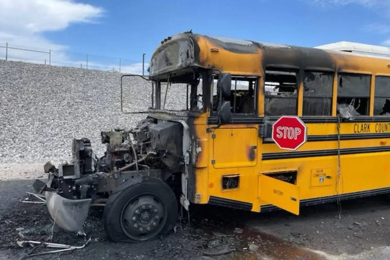 A burned out school bus on the 215 Northern Beltway