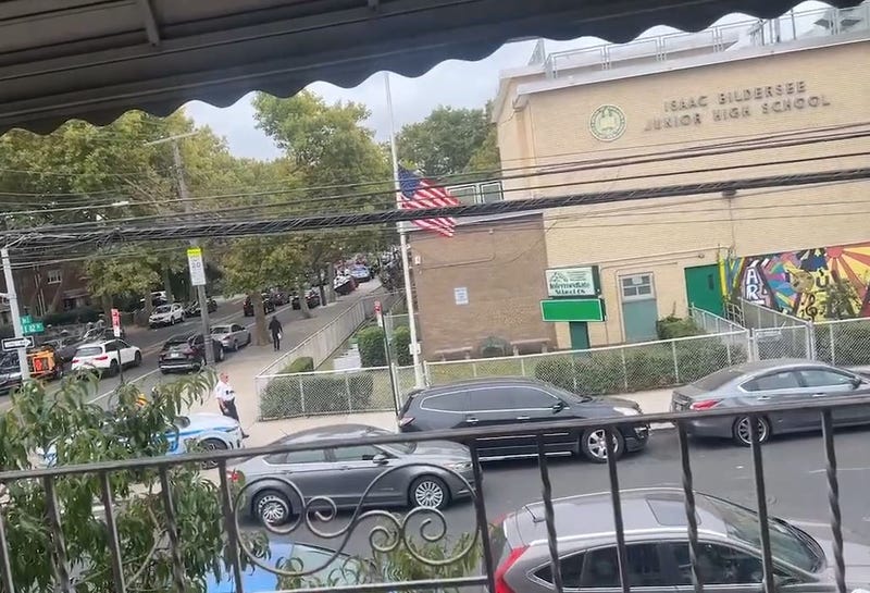 Citizen App footage from the scene shows police investigating outside a Canarsie junior high after two 17-year-old boys were shot on Wednesday.