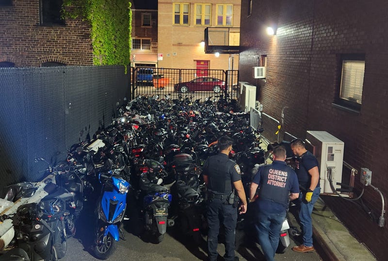 Nearly 100 illegal scooters and mopeds were seized from northern Queens in a one-night operation in early May