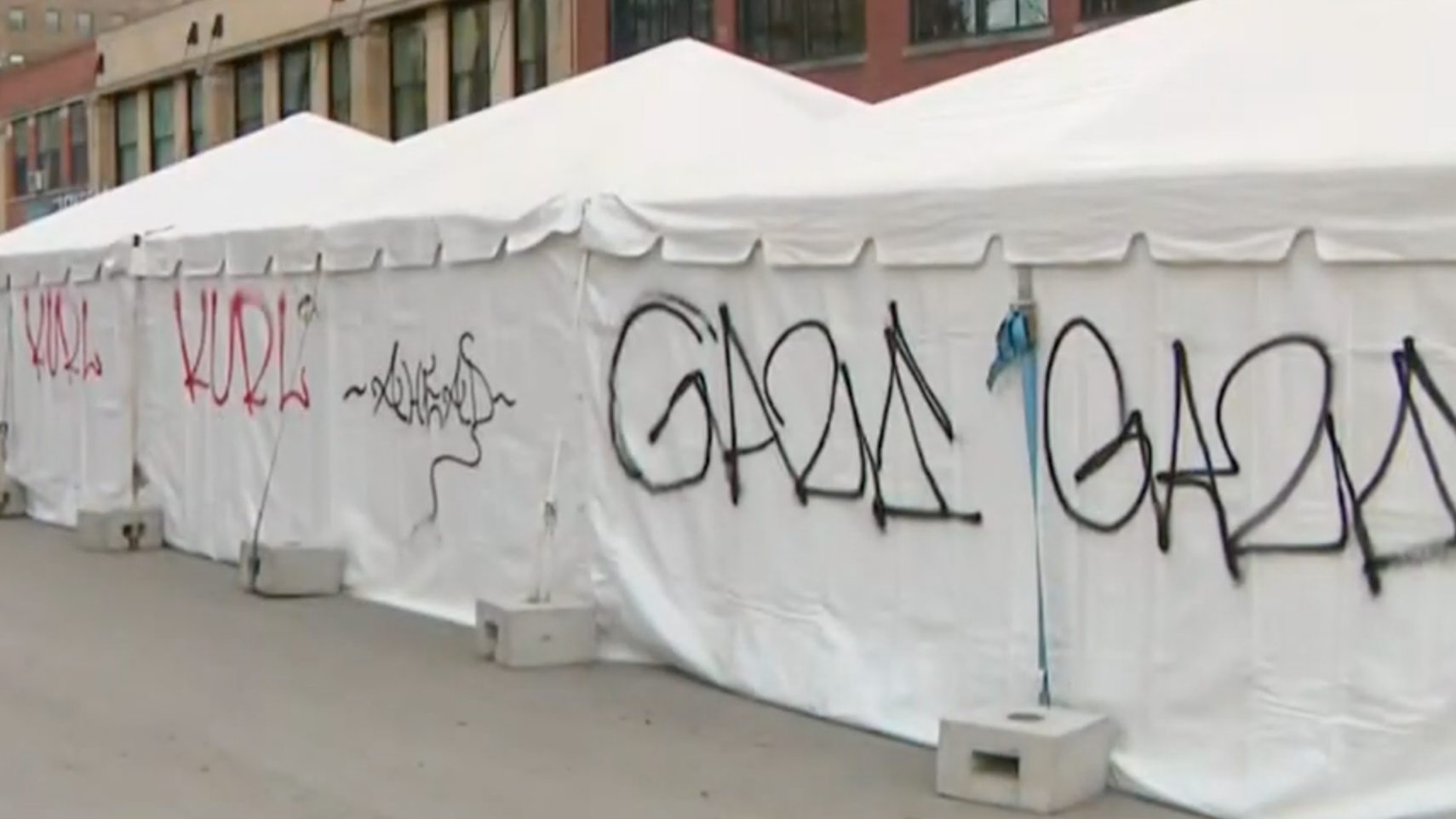 Vandals graffiti outdoor dining tents in West Loop