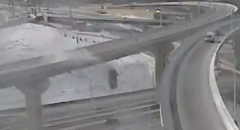 A driver survived when his pickup truck plunged about 70 feet (21 meters) off a slippery interchange exit ramp in Wisconsin.