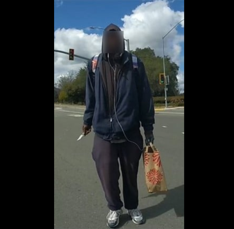 An unidentified man seen on police body camera stills from Thursday's officer-involved shooting.