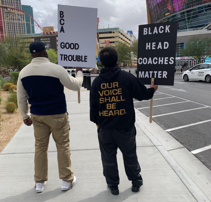 Lou Richie demonstrates the need for coaches of color with the Black Coaches Association outside the Pac-12 Men's Basketball Tournament in Las Vegas.