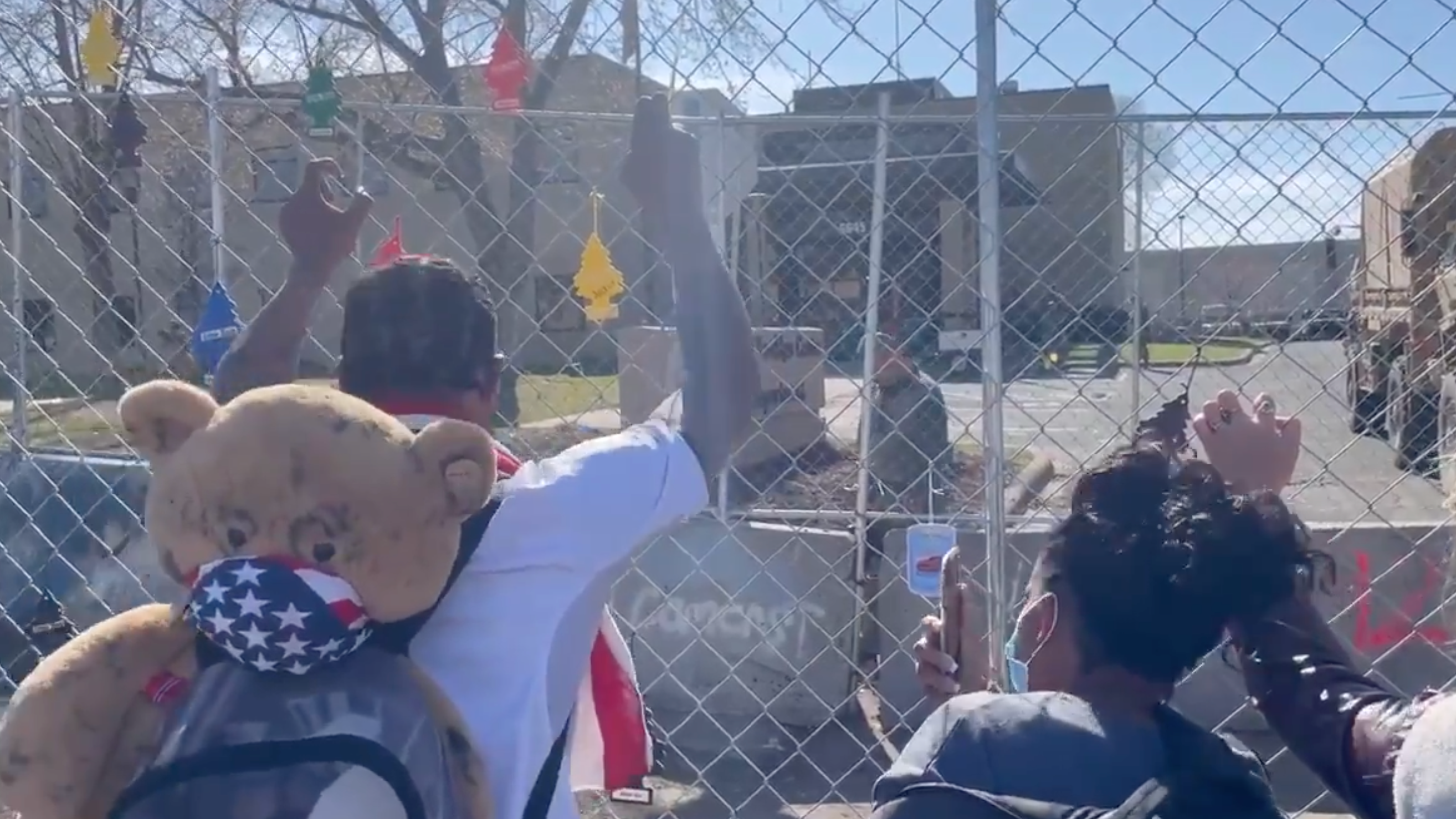 Man leads prayer at Brooklyn Center Police Department after Daunte Wright shooting