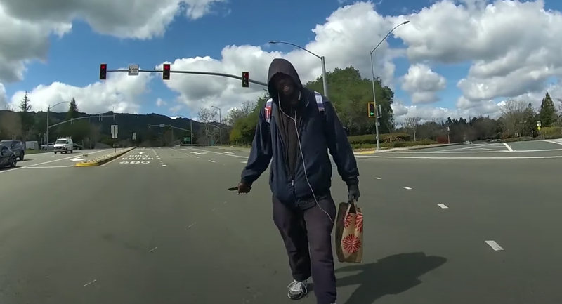 Still shot taken from body cam footage as Officer Andrew Hall approached Tyrell Wilson in the middle of an intersection on March 11.