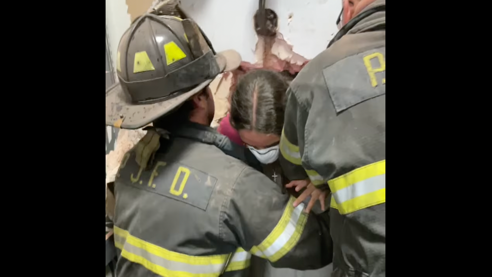 VIDEO: LI firefighters drill through wall to rescue girl trapped in dressing room