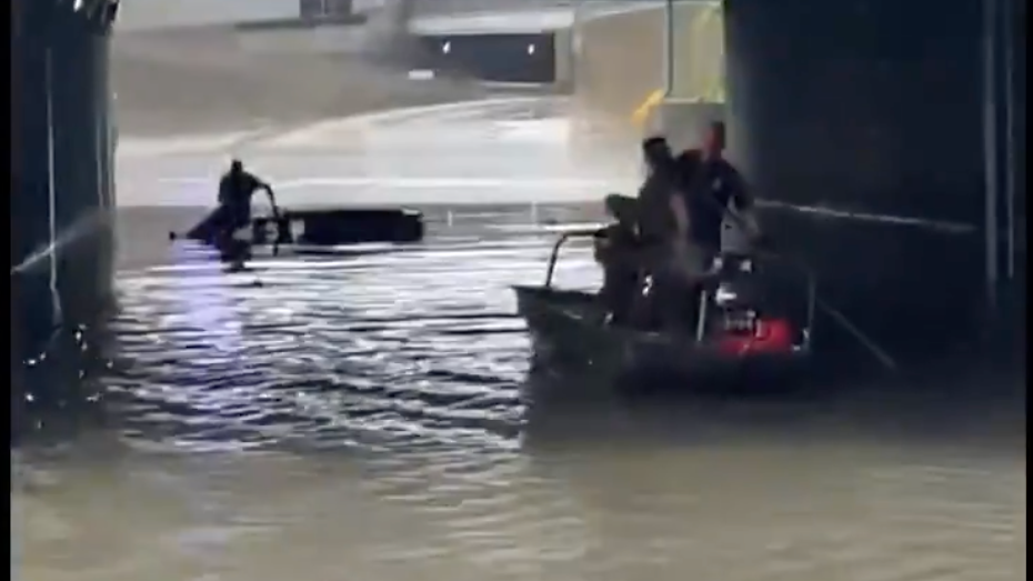 WATCH: Man rescued by boat from flooded Lodge in downtown Detroit