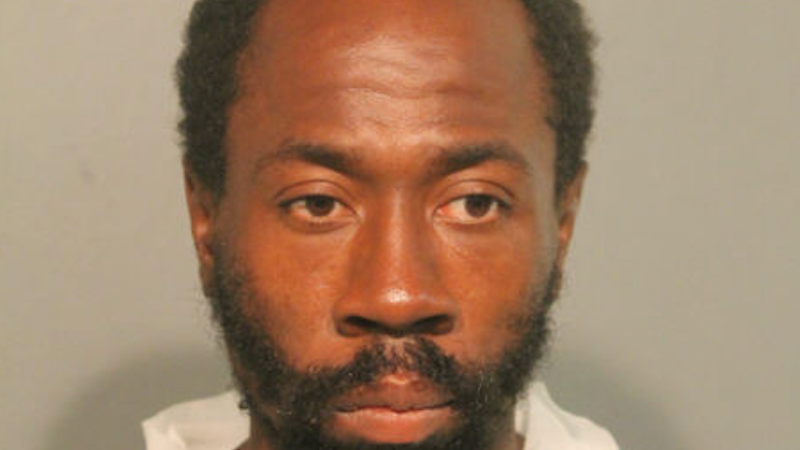 Suspect charged in bank employee's stabbing death