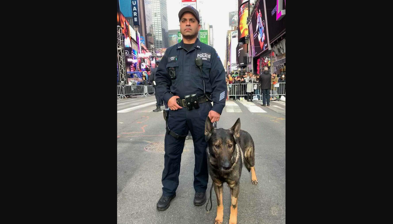 NYPD Det. Robert Jubraj and Canine Unit member Kobe, who passed away after eight years of service, the department announced Wednesday.