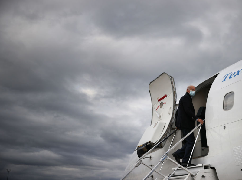 Democratic presidential nominee Joe Biden boards his plane at Gerald Ford Airport after campaigning October 02, 2020.