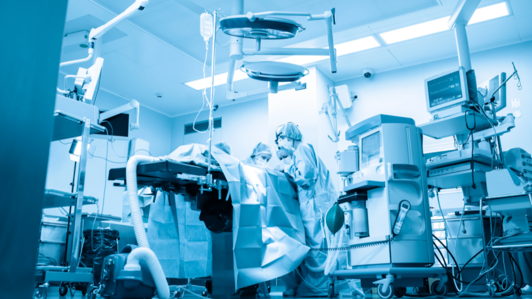 COVID-19 hospitalizations dropping, not "totally out of the woods"