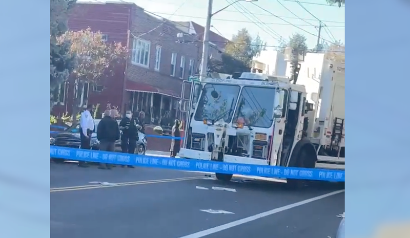 Woman struck by garbage truck in Brooklyn