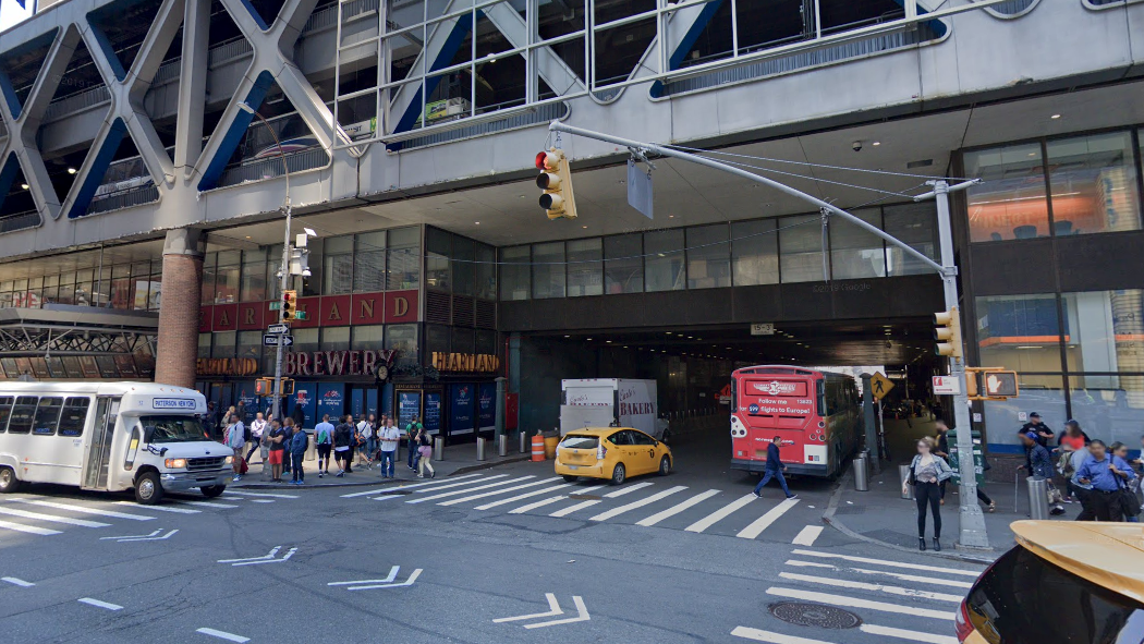 Man fatally struck while lying under box truck near Times Square