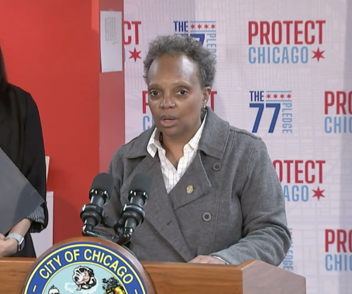 Lightfoot at lectern