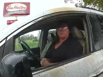 Dusty Jackson after a Tim Hortons employee allegedly threw coffee on her