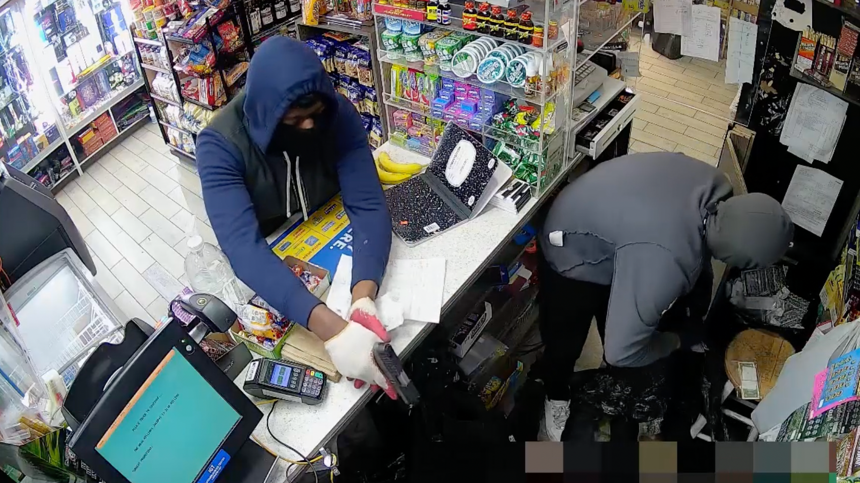 VIDEO: 2 men take $10K in cash from Brooklyn bodega in armed robbery