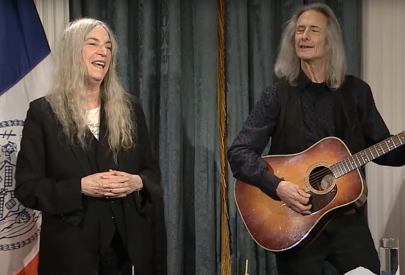Patti Smith and Lenny Kaye perform at the mayor's briefing