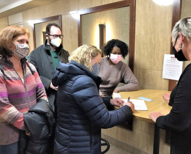 woman filing out request
